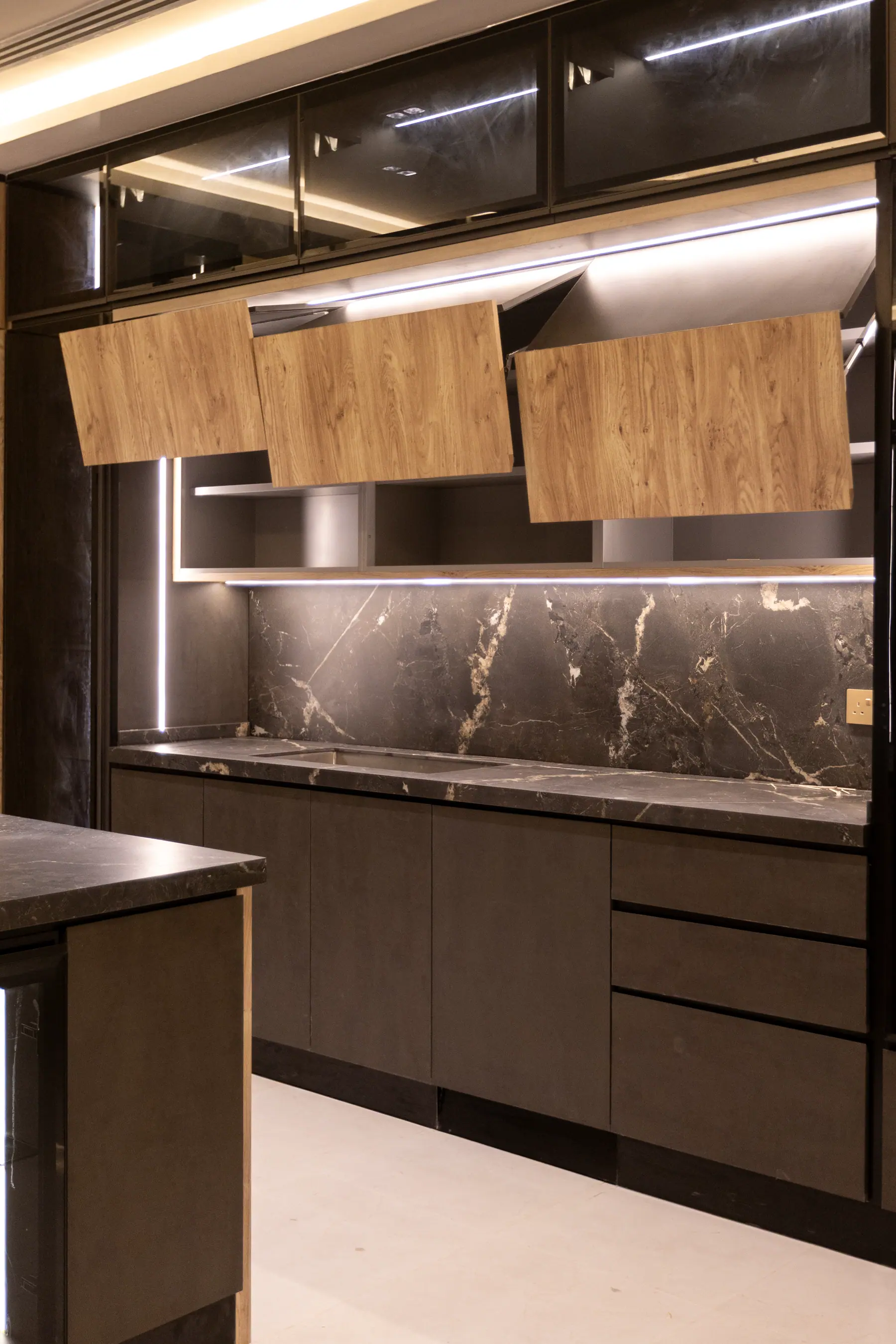 Luxurious marble and quartz countertops on aluminum kitchen cabinets
